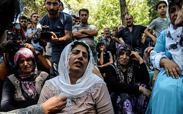 Women cry during a funeral for a victim of last night's attack on a wedding party that left 50 dead in Gaziantep in southeastern Turkey near the Syrian border, on August 21, 2016. (AFP Photo/Ilyas Akengin) Women cry during a funeral for a victim of last night's attack on a wedding party that left 50 dead in Gaziantep in southeastern Turkey near the Syrian border, on August 21, 2016. (AFP Photo/Ilyas Akengin)