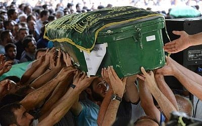 People carry a coffin during a funeral for victims of last night's attack on a wedding party that left 54 dead in Gaziantep in southeastern Turkey near the Syrian border on August 21, 2016. (AFP Photo/Ilyas Akengin) People carry a coffin during a funeral for victims of last night's attack on a wedding party that left 54 dead in Gaziantep in southeastern Turkey near the Syrian border on August 21, 2016. (AFP Photo/Ilyas Akengin)