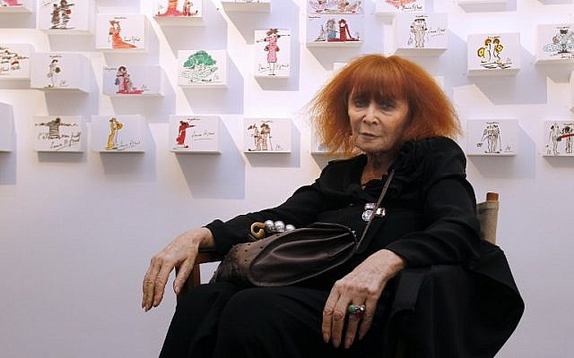 French fashion designer Sonia Rykiel posing for photographs in Paris, on the eve of the start of an exhibition of 200 of her drawings, June 3, 2010. (AFP PHOTO/FRANCOIS GUILLOT)