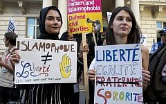 Women join a demonstration organized by "Stand up to Racism" outside the French Embassy in London on August 26, 2016 against the burkini ban on French beaches. (AFP Photo/Justin Tallis)