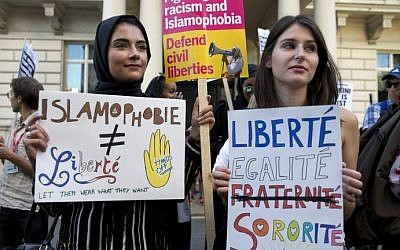 Women join a demonstration organized by "Stand up to Racism" outside the French Embassy in London on August 26, 2016 against the burkini ban on French beaches. (AFP Photo/Justin Tallis)