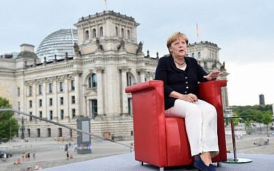 German Chancellor Angela Merkel gestures during her summer interview with journalists of German public broadcaster ARD on August 28, 2016 in Berlin. (AFP/dpa /Rainer Jensen)