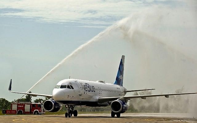 The first commercial flight between the United States and Cuba since 1961 lands in Santa Clara, Cuba on August 31, 2016. (AFP Photo/Yamil Lage) The first commercial flight between the United States and Cuba since 1961 lands in Santa Clara, Cuba on August 31, 2016. (AFP Photo/Yamil Lage)