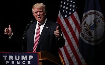 Republican presidential nominee Donald Trump holds two thumbs up during a campaign event at Briar Woods High School August 2, 2016 in Ashburn, Virginia. Trump continued to campaign for his run for president of the United States.  (Alex Wong/Getty Images/AFP)