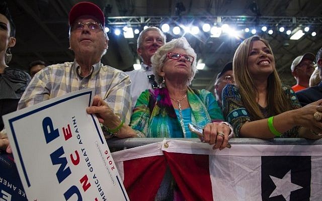 Supporters listen to Republican presidential candidate Donald Trump speak at a rally on August 5, 2016 in Green Bay, Wisconsin. (Darren Hauck/Getty Images/AFP)e Donald Trump Holds Rally In Green Bay, Wisconsin Supporters listen to Republican presidential candidate Donald Trump speak at a rally on August 5, 2016 in Green Bay, Wisconsin. (Darren Hauck/Getty Images/AFP)