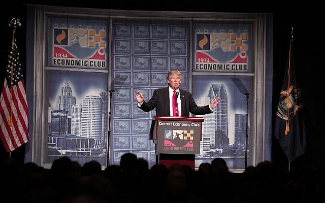 Republican presidential candidate Donald Trump delivers a policy address detailing his economic plan at the Detroit Economic Club in Detroit Michigan, August 8, 2016. (Bill Pugliano/Getty Images/AFP) Republican presidential candidate Donald Trump delivers a policy address detailing his economic plan at the Detroit Economic Club in Detroit Michigan, August 8, 2016. (Bill Pugliano/Getty Images/AFP)