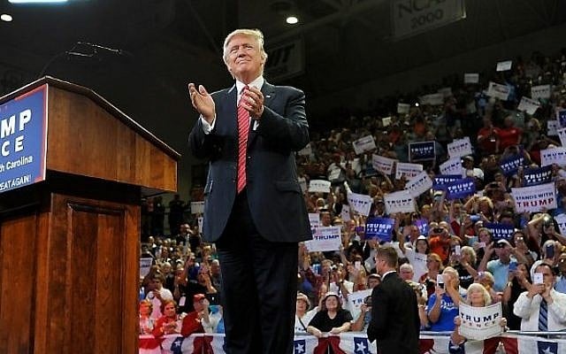 US Republican presidential candidate Donald Trump claps with the audience during a campaign event in Wilmington, North Carolina, August 9, 2016. (Sara D. Davis/Getty Images/AFP) US Republican presidential candidate Donald Trump claps with the audience during a campaign event in Wilmington, North Carolina, August 9, 2016. (Sara D. Davis/Getty Images/AFP)