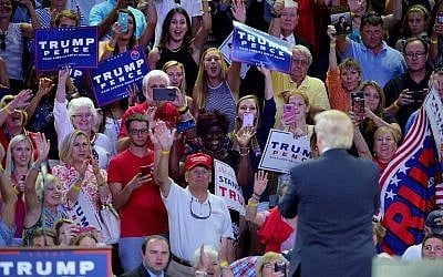 Supporters for Republican presidential candidate Donald Trump cheer for him during a campaign event at Trask Coliseum on August 9, 2016 in Wilmington, North Carolina. (Sara D. Davis/Getty Images/AFP)
