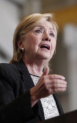 Democratic presidential nominee Hillary Clinton delivers a speech on the U.S economy at Futuramic Tool & Engineering August 11, 2016 in Warren, Michigan. (Bill Pugliano/Getty Images/AFP)