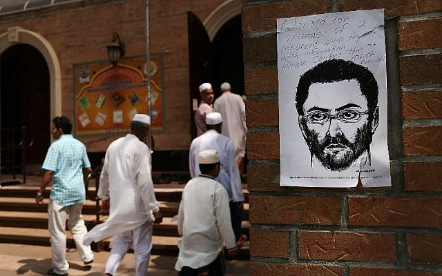 A sketch of a suspect is taped to a wall outside of a mosque up the street from the Al-Furqan Jame Masjid mosque where Imam Maulama Akonjee and his assistant, Thara Uddin, 64, were killed in a shooting on August 13 in the Queens borough of New York on August 15, 2016 in New York City. (Spencer Platt/Getty Images/AFP) A sketch of a suspect is taped to a wall outside of a mosque up the street from the Al-Furqan Jame Masjid mosque where Imam Maulama Akonjee and his assistant, Thara Uddin, 64, were killed in a shooting on August 13 in the Queens borough of New York on August 15, 2016 in New York City. (Spencer Platt/Getty Images/AFP)