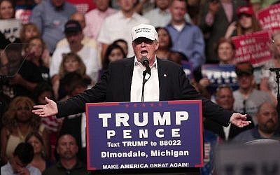 Republican presidential nominee Donald Trump speaks at a campaign rally in Dimondale, Michigan on August 19, 2016. (Bill Pugliano/Getty Images/AFP)