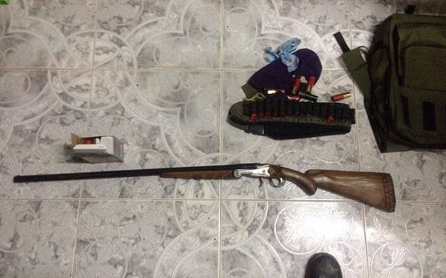 A shotgun, ammunition and other equipment seized by IDF troops in the Palestinian village Jaba in an overnight raid on August 18, 2016. (IDF Spokesperson's Unit)