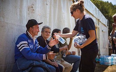 IsraAID volunteers help bring supplies to earthquake victims in Scai, Italy. August 27, 2016. (Courtesy) IsraAID volunteers help bring supplies to earthquake victims in Scai, Italy. August 27, 2016. (Courtesy)