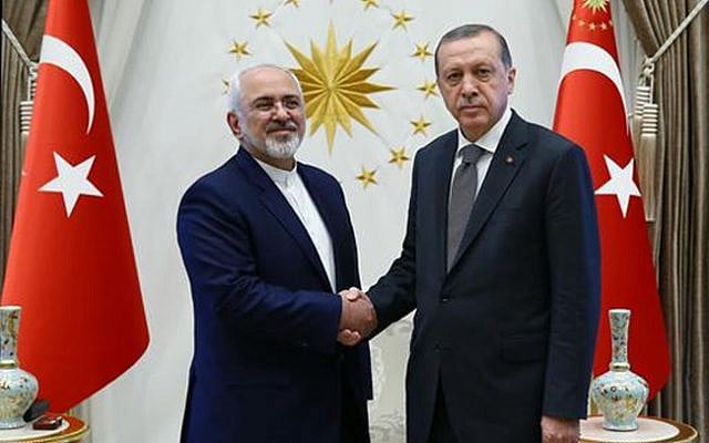 File: Turkish President Recep Tayyip Erdogan, right, shakes hands with Iranian Foreign Minister Mohammad Javad Zarif at a meeting in Ankara, Friday, August 12, 2016. (Kayan Ozer/Presidential Press Service via AP) File: Turkish President Recep Tayyip Erdogan, right, shakes hands with Iranian Foreign Minister Mohammad Javad Zarif at a meeting in Ankara, Friday, August 12, 2016. (Kayan Ozer/Presidential Press Service via AP)