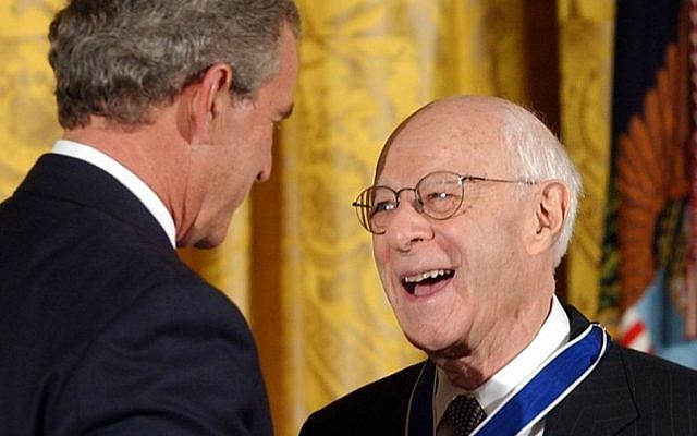 US president George W. Bush presents Norman Podhoretz (right) with the Presidential Medal of Freedom, the nation's highest civil award, during a ceremony in the East Room of the White House, June 23, 2004 (Susan Walsh/AP)