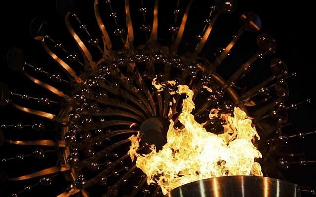 Flames burn in the Olympic cauldron after being lit during the opening ceremony of the 2016 Summer Olympics in Rio de Janeiro, Brazil, Saturday, Aug. 6, 2016. (AP Photo/Gregory Bull) Flames burn in the Olympic cauldron after being lit during the opening ceremony of the 2016 Summer Olympics in Rio de Janeiro, Brazil, Saturday, Aug. 6, 2016. (AP Photo/Gregory Bull)