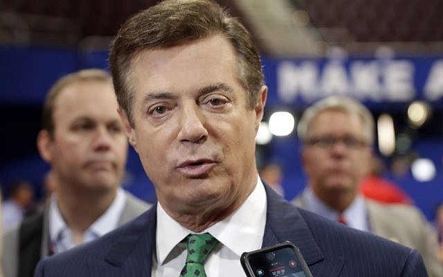 In this July 17, 2016 file photo, then-Trump campaign chairman Paul Manafort talks to reporters on the floor of the Republican National Convention at Quicken Loans Arena in Cleveland. (Matt Rourke/AP) In this July 17, 2016 file photo, then-Trump campaign chairman Paul Manafort talks to reporters on the floor of the Republican National Convention at Quicken Loans Arena in Cleveland. (Matt Rourke/AP)