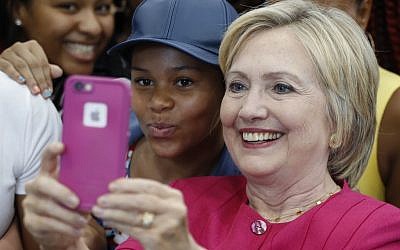 Democratic presidential candidate Hillary Clinton takes cellphone photos with audience members after speaking at a Pennsylvania Democratic Party voter registration event at West Philadelphia High School in Philadelphia, Tuesday, Aug. 16, 2016. (AP Photo/Carolyn Kaster) Democratic presidential candidate Hillary Clinton takes cellphone photos with audience members after speaking at a Pennsylvania Democratic Party voter registration event at West Philadelphia High School in Philadelphia, Tuesday, Aug. 16, 2016. (AP Photo/Carolyn Kaster)