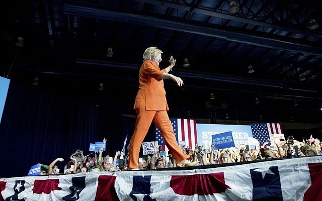 Democratic presidential candidate Hillary Clinton arrives to speak at a rally at Osceola Heritage Park, in Kissimmee, Florida, Monday, Aug. 8, 2016. (AP Photo/Andrew Harnik)