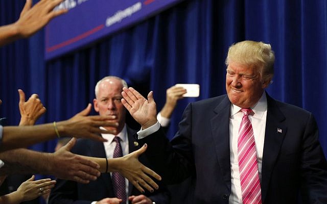 Republican presidential candidate Donald Trump arrives to speak at a campaign rally in Fredericksburg, Va., Saturday, August 20, 2016. (AP/Gerald Herbert) Republican presidential candidate Donald Trump arrives to speak at a campaign rally in Fredericksburg, Va., Saturday, August 20, 2016. (AP/Gerald Herbert)