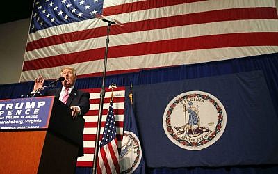 Republican presidential candidate Donald Trump arrives to speak at a campaign rally in Fredericksburg, Virginia, Saturday, Aug. 20, 2016. (AP Photo/Gerald Herbert)
