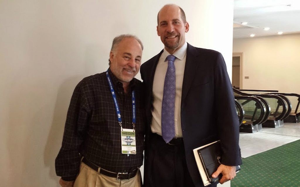 Baseball writer Dan Schlossberg, left, with the former Atlanta Brave and Hall of Fame pitcher John Smoltz. (Courtesy of Dan Schlossberg/via JTA) Baseball writer Dan Schlossberg, left, with the former Atlanta Brave and Hall of Fame pitcher John Smoltz. (Courtesy of Dan Schlossberg/via JTA)