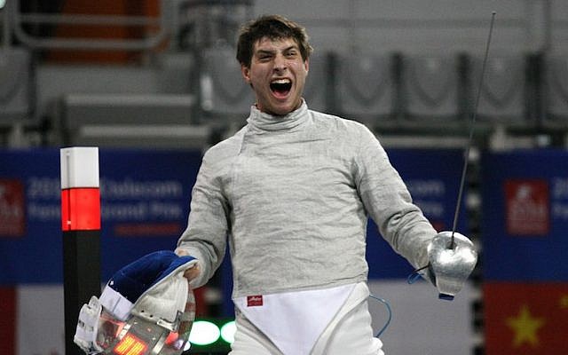 Eli Dershwitz of the USA celebrating victory over Iran’s Mojtaba Abedini in an FIE Grand Prix match in Seoul, South Korea, March 26, 2016. (Mark Deibert/FIE via Getty Images) Eli Dershwitz of the USA celebrating victory over Iran’s Mojtaba Abedini in an FIE Grand Prix match in Seoul, South Korea, March 26, 2016. (Mark Deibert/FIE via Getty Images)