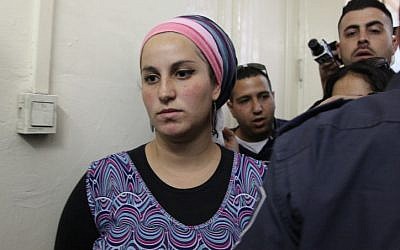 Eliraz Fine, a 24-year-old Israeli settler from the northern West Bank settlement of Yitzhar, in court for suspected "inciting violence against soldiers" on May 7, 2014, at the Jerusalem Magistrates Court. (Meital Cohen/Flash90)