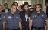 Rabbi Yoshiyahu Yosef Pinto arrives to testify in Jerusalem District Court on August 1, 2016. (Yonatan Sindel/Flash90)