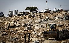 Israeli troops demolish 5 sheds in the West Bank village of Um Alkhair, south of Hebron on August 9, 2016. T(Wisam Hashlamoun/Flash90)
