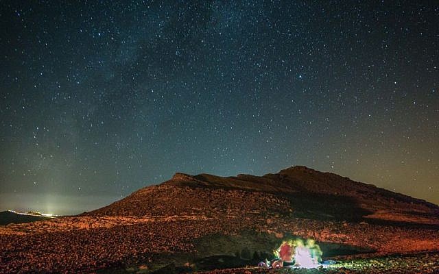 View of the stars during a meteor shower in the skies above the Negev desert, near Mitzpe Ramon on August 12, 2016. (Edi Israel/Flash90)