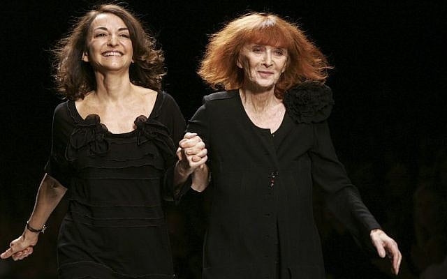 French fashion designers Sonia Rykiel, right, and her daughter Nathalie Rykiel acknowledge applause after the presentation of their Spring-summer 2007 ready-to-wear collection, in Paris, France, October 6, 2006. (AP Photo/Jacques Brinon)