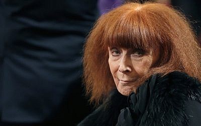 French fashion designer Sonia Rykiel attends a ceremony in Paris, France,  Novembe 26, 2013. (Christian Hartmann, Pool via AP)
