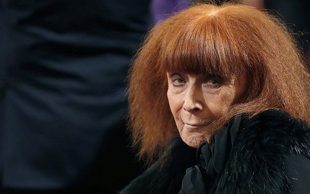 French fashion designer Sonia Rykiel attends a ceremony in Paris, France, Novembe 26, 2013. (Christian Hartmann, Pool via AP) French fashion designer Sonia Rykiel attends a ceremony in Paris, France, Novembe 26, 2013. (Christian Hartmann, Pool via AP)