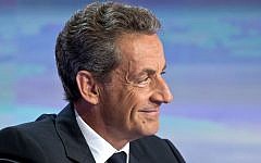 Former French president Nicolas Sarkozy speaks to  the media outside Paris on August 24, 2016. (AP Photo/Michel Euler)