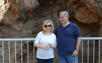 Prime Minister Benjamin Netanyahu and his wife Sara visit the Nahal Me'arot Nature Reserve, Northern Israel, on August 19, 2016. (Amos Ben Gershom/GPO)