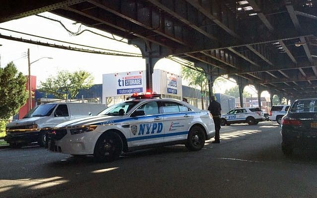 File: New York City police secure a crime scene in the Queens borough of New York, Saturday, Aug. 13, 2016. (AP Photo/Jennifer Peltz) File: New York City police secure a crime scene in the Queens borough of New York, Saturday, Aug. 13, 2016. (AP Photo/Jennifer Peltz)