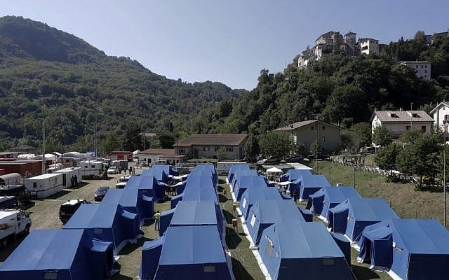 A view of a tent camp set as a temporary shelter for the earthquake survivors in Arquata Del Tronto, Italy, Sunday, August 28, 2016. (AP/Gregorio Borgia)