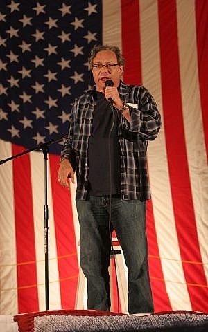 Lewis Black performs for the Marines in December, 2009. (Public domain)