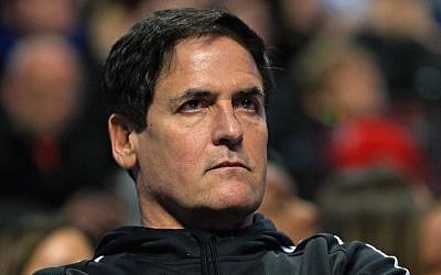 Mark Cuban, owner of the Dallas Mavericks, watching as his team takes on the Chicago Bulls in Chicago, January 15, 2016. (Jonathan Daniel/Getty Images/JTA)