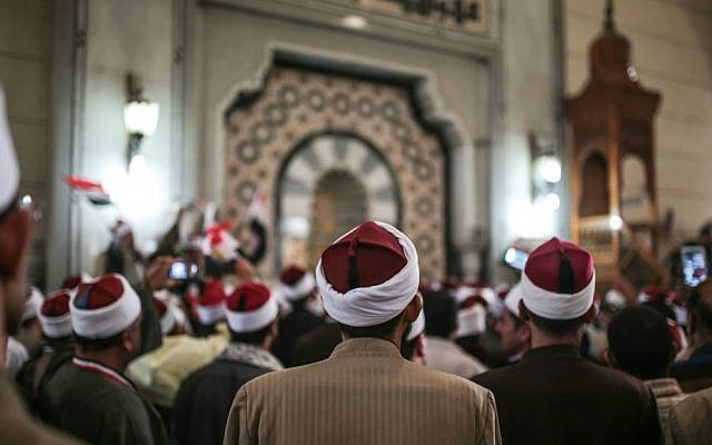 In this Feb. 3, 2015 file photo, Egyptian clerics from the Al-Azhar institution rally to denounce terrorism and show solidarity with the Egyptian government and security forces at a mosque in central Cairo, Egypt. (AP Photo/Mosa'ab Elshamy, File) In this Feb. 3, 2015 file photo, Egyptian clerics from the Al-Azhar institution rally to denounce terrorism and show solidarity with the Egyptian government and security forces at a mosque in central Cairo, Egypt. (AP Photo/Mosa'ab Elshamy, File)