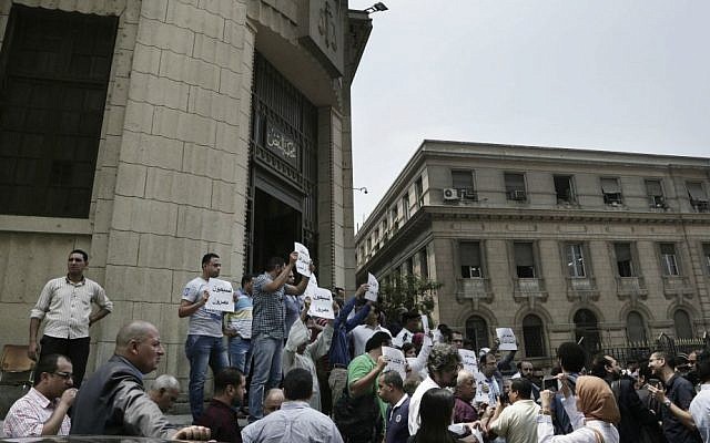 Egyptians protest against the latest surge of assaults on Christians in Cairo, Egypt, Saturday, Aug. 13, 2016. (AP Photo/Nariman El-Mofty)