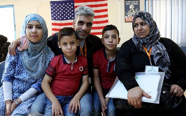 Five members of the Jouriyeh family, Syrian refugees headed to the US as part of a resettlement program. (AP Photo/Raad Adayleh) Five members of the Jouriyeh family, Syrian refugees headed to the US as part of a resettlement program. (AP Photo/Raad Adayleh)