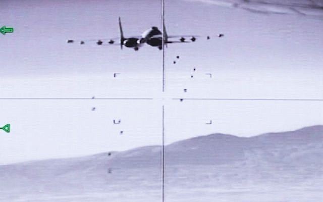 A video released by the Russian Defense Ministry in Moscow shows a Russian warplane unloading its weapons over a Syrian target, August 10, 2016. (AP/Ivan Sekretarev) A video released by the Russian Defense Ministry in Moscow shows a Russian warplane unloading its weapons over a Syrian target, August 10, 2016. (AP/Ivan Sekretarev)