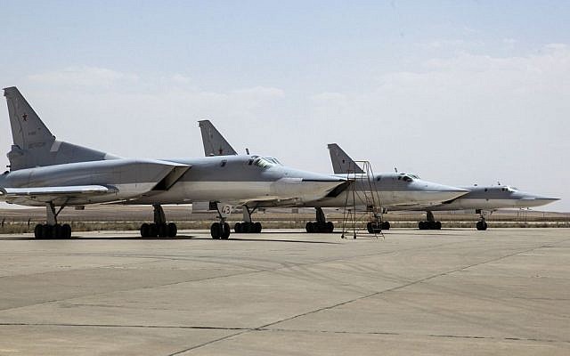 A Russian Tu-22M3 bomber stands on the tarmac at an air base near Hamedan, Iran, Monday, August 15, 2016. (WarfareWW Photo via AP)