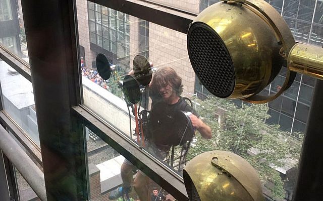A man scales the all-glass face of Trump Tower in New York, Wednesday, Aug. 10, 2016. (Alex Cannon/AP) A man scales the all-glass face of Trump Tower in New York, Wednesday, Aug. 10, 2016. (Alex Cannon/AP)