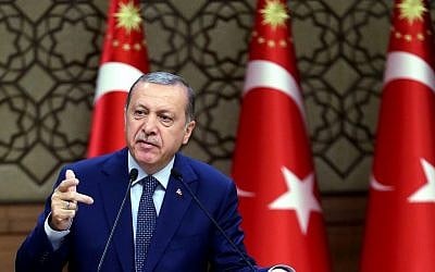 Turkey's President Recep Tayyip Erdogan speakes to the heads of chambers of commerce in Ankara, Turkey, on Thursday, Aug. 4, 2016. (Kayhan Ozer/Presidential Press Service, Pool Photo via AP)