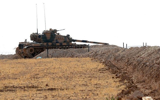 A Turkish tank stationed near the Syrian border, in Karkamis, Turkey, August 29, 2016. (Ismail Coskun/IHA via AP) A Turkish tank stationed near the Syrian border, in Karkamis, Turkey, August 29, 2016. (Ismail Coskun/IHA via AP)