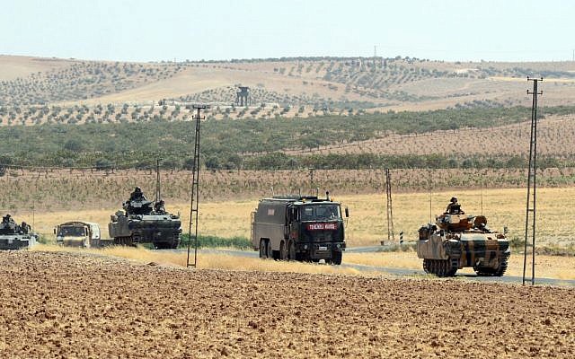Turkish troops heading to the Syrian border, in Karkamis, Turkey, August 27, 2016. (Ismail Coskun, IHA via AP) Turkish troops heading to the Syrian border, in Karkamis, Turkey, August 27, 2016. (Ismail Coskun, IHA via AP)