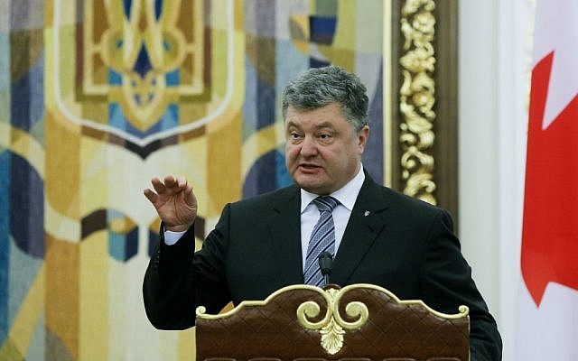 In this file photo dated Monday, July 11, 2016, Ukrainian President Petro Poroshenko gestures during a news conference in Kiev, Ukraine. (AP Photo/Efrem Lukatsky, File) In this file photo dated Monday, July 11, 2016, Ukrainian President Petro Poroshenko gestures during a news conference in Kiev, Ukraine. (AP Photo/Efrem Lukatsky, File)